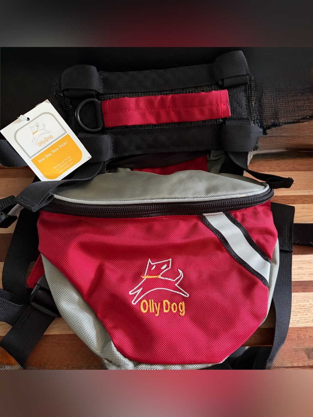 NWT  OLLY DOG PACK the size small! Great pack Adjust,2 zip pouch’s & reflective